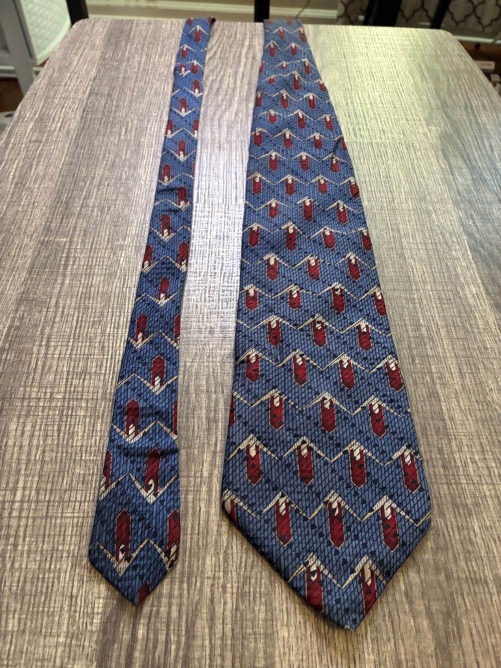 Nautica Blue Silk Tie with Red and Cream Geometric Pattern